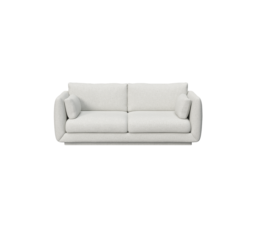 Lys grå moderne sofa med rene linjer og myke puter.
