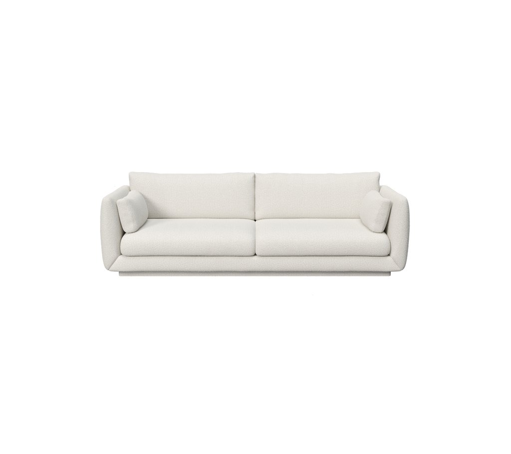 en moderne hvit sofa med minimalistisk design.