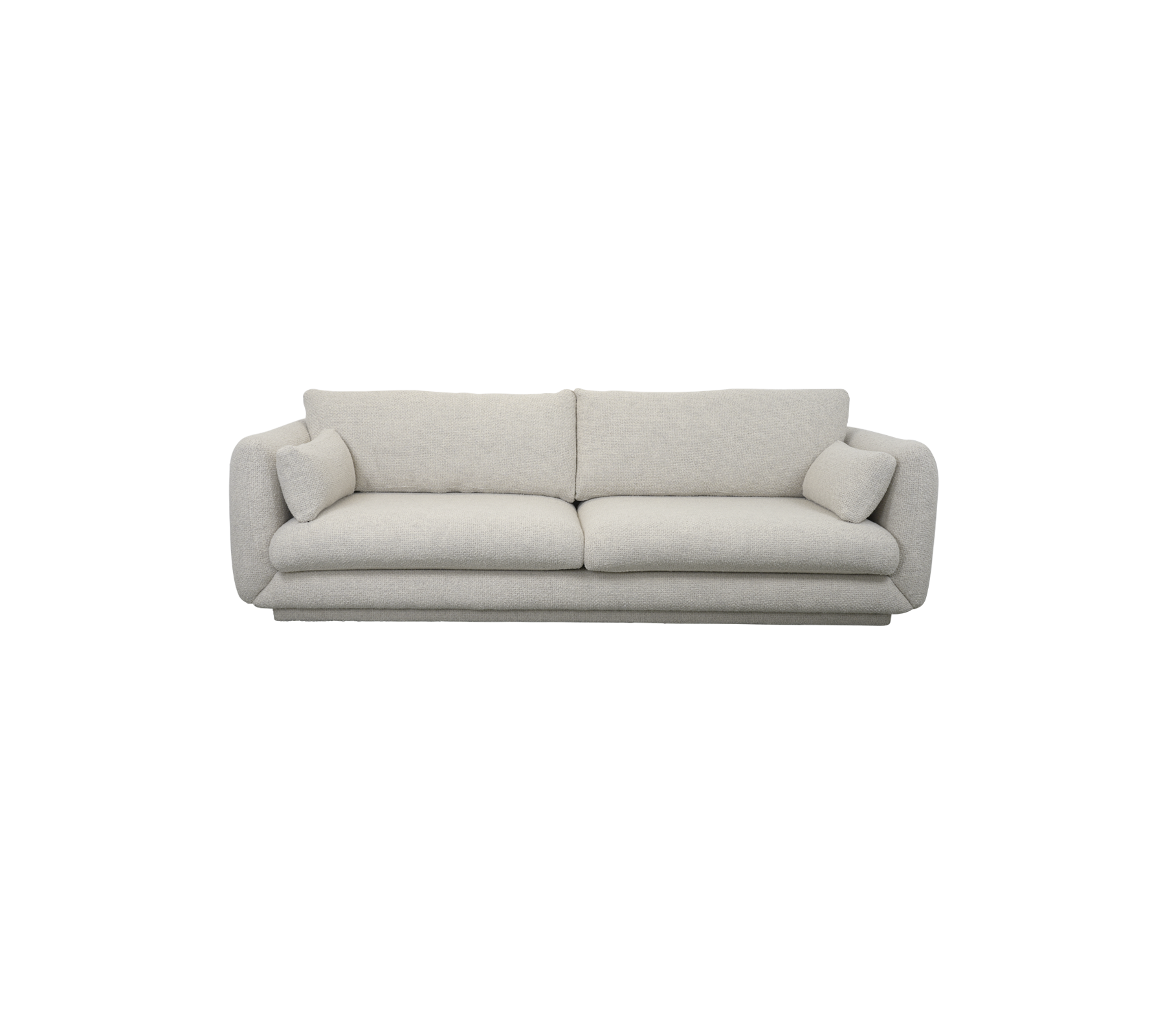 En moderne, lys sofa med myke puter og to dekorative puter i hver ende, designet for komfort og stil.