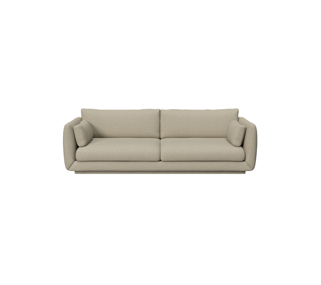 Brun moderne sofa med myke puter i en loungestil.