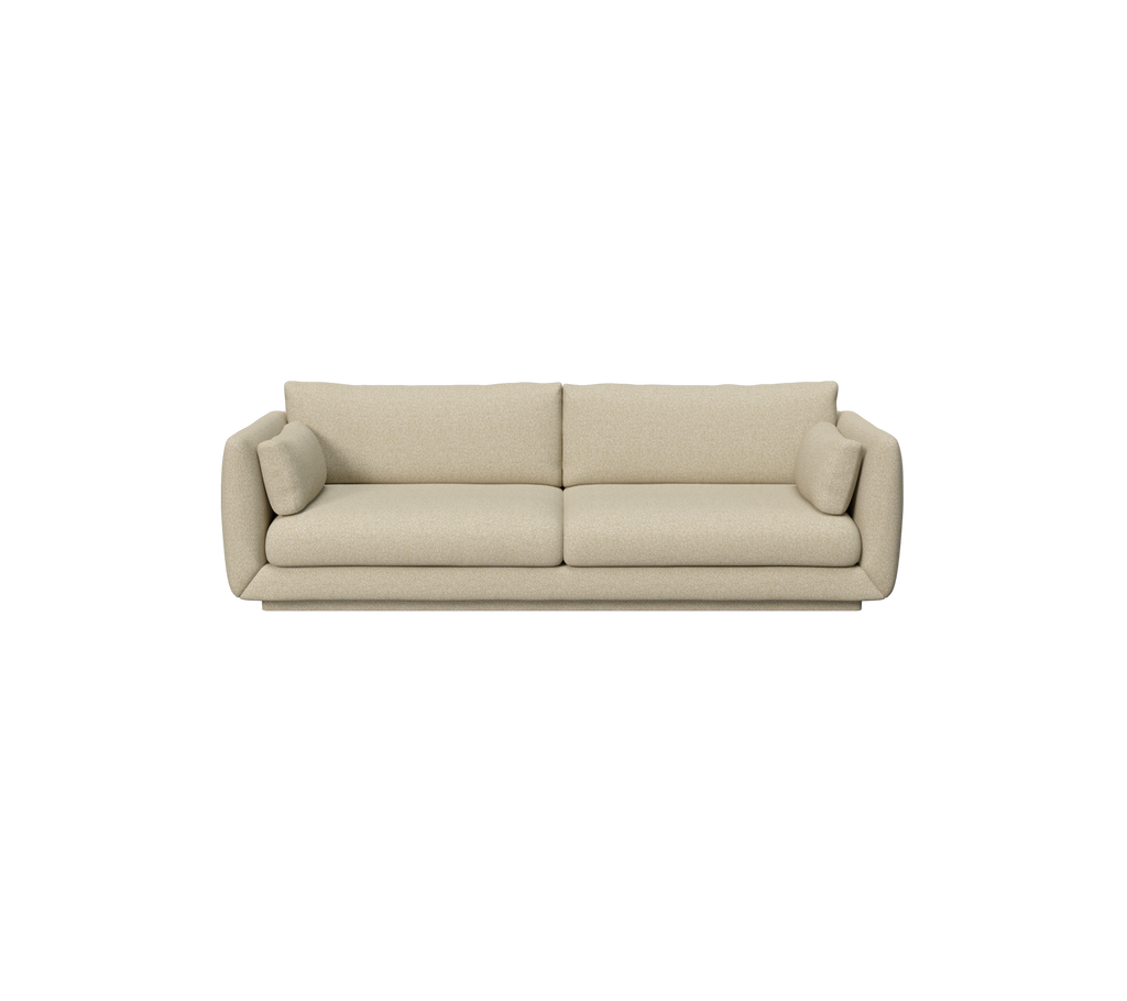 Lysbrun moderne sofa med puter i et minimalistisk design.