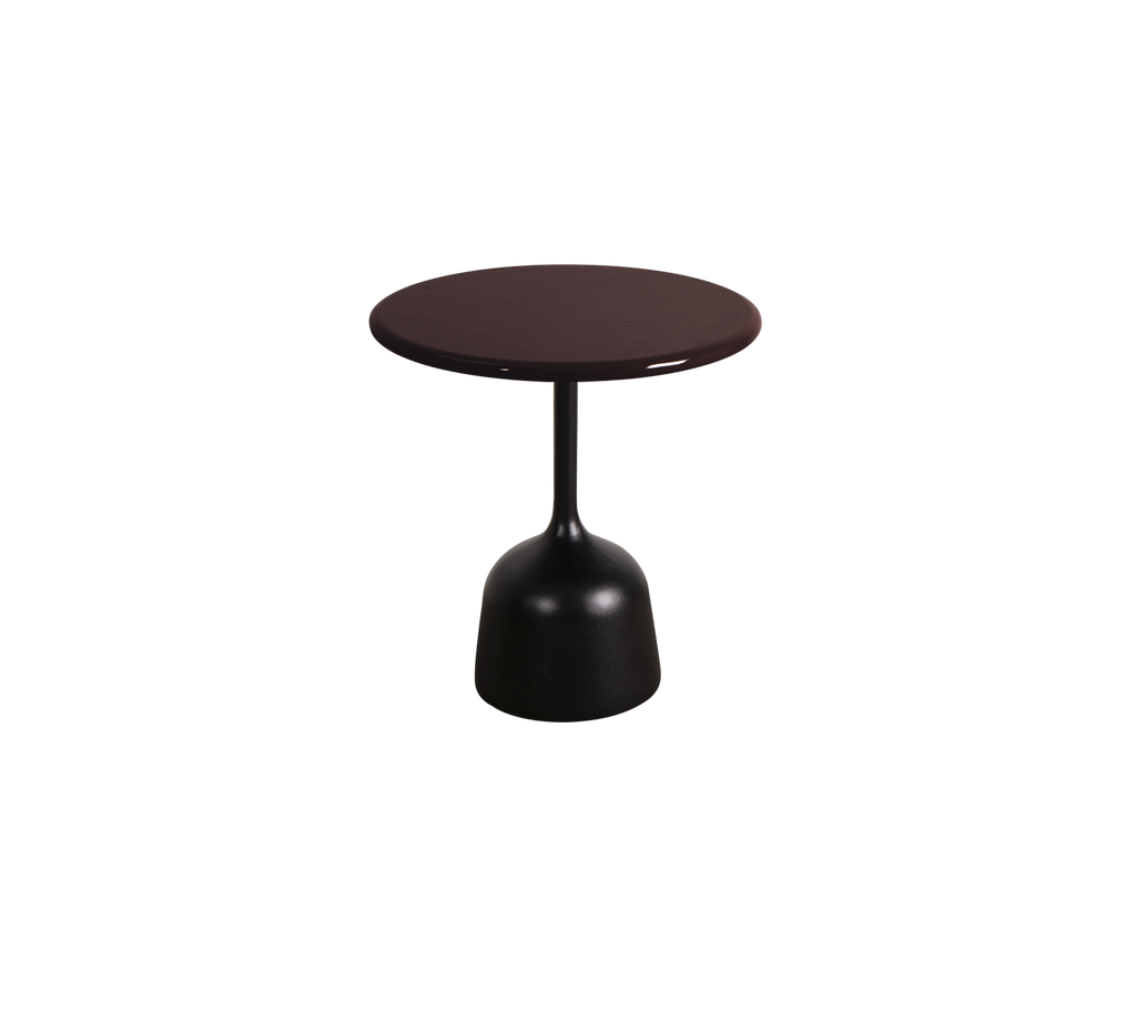 Burgundisk rundt bord med en slank base.