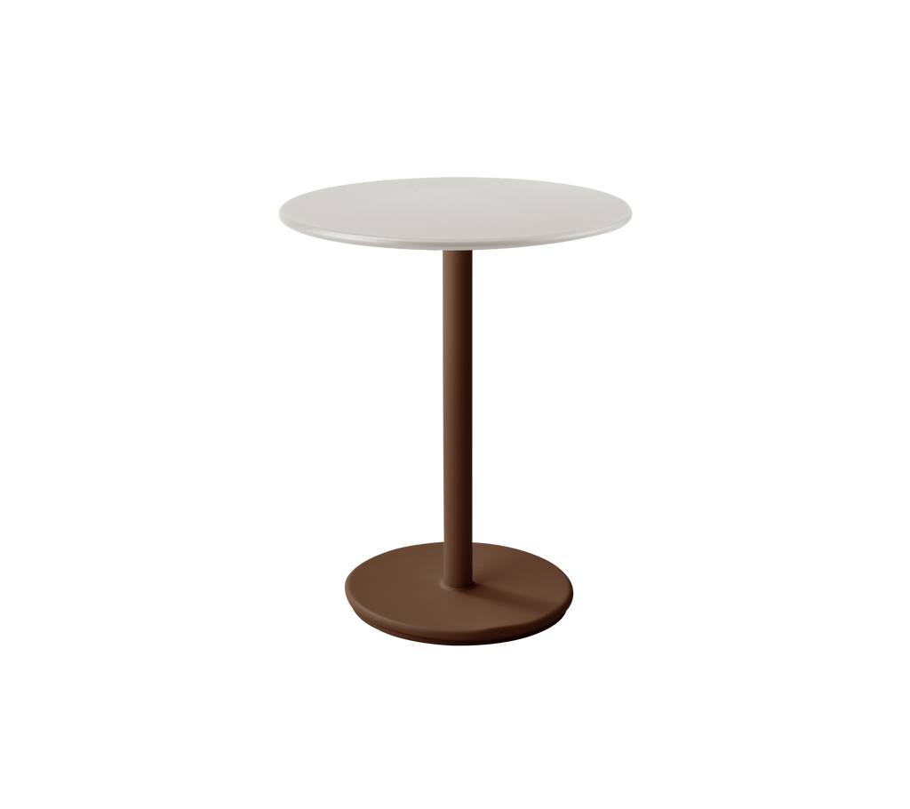 Moderne hvit bord med ørkenrød base i en stilfull loungeinnstilling.