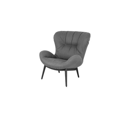 Koselig grå akcentstol med et plysj, buet design og fire slanke ben, som gir et moderne preg til ethvert rom.