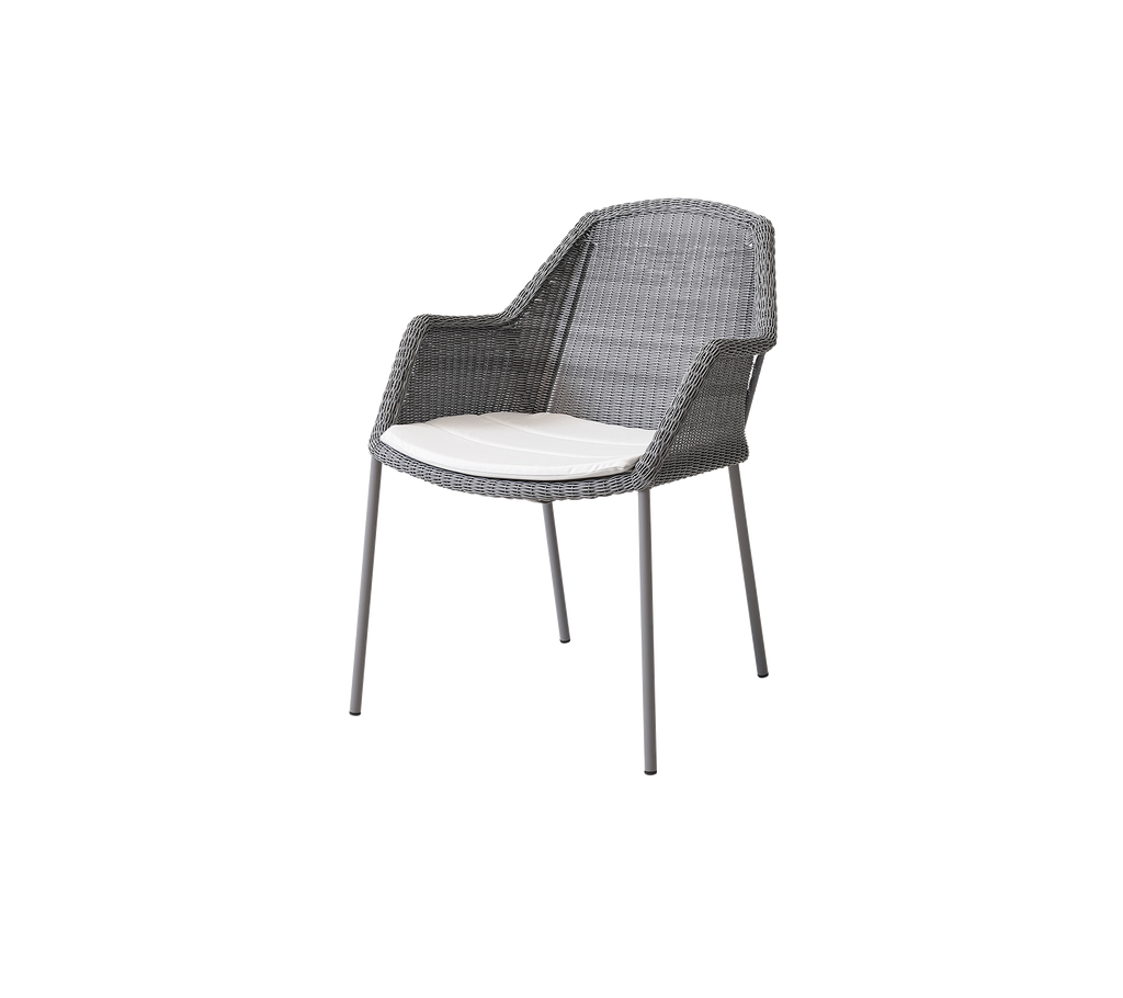Stylish gray chair with a woven design and a light cushion, perfect for relaxed seating in various settings.