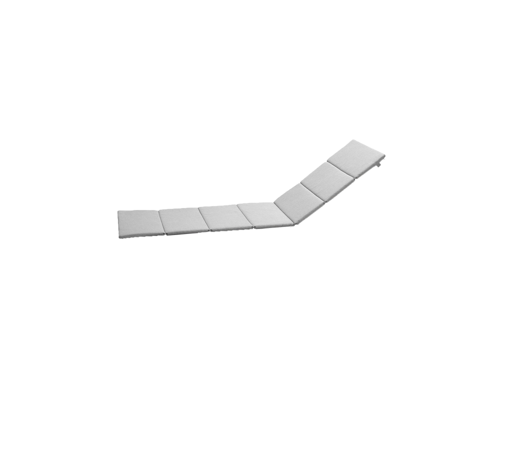 Rektangulær, flat overflate med flere sammenkoblede segmenter som skaper en lett kurve for allsidig plassering og bruk.