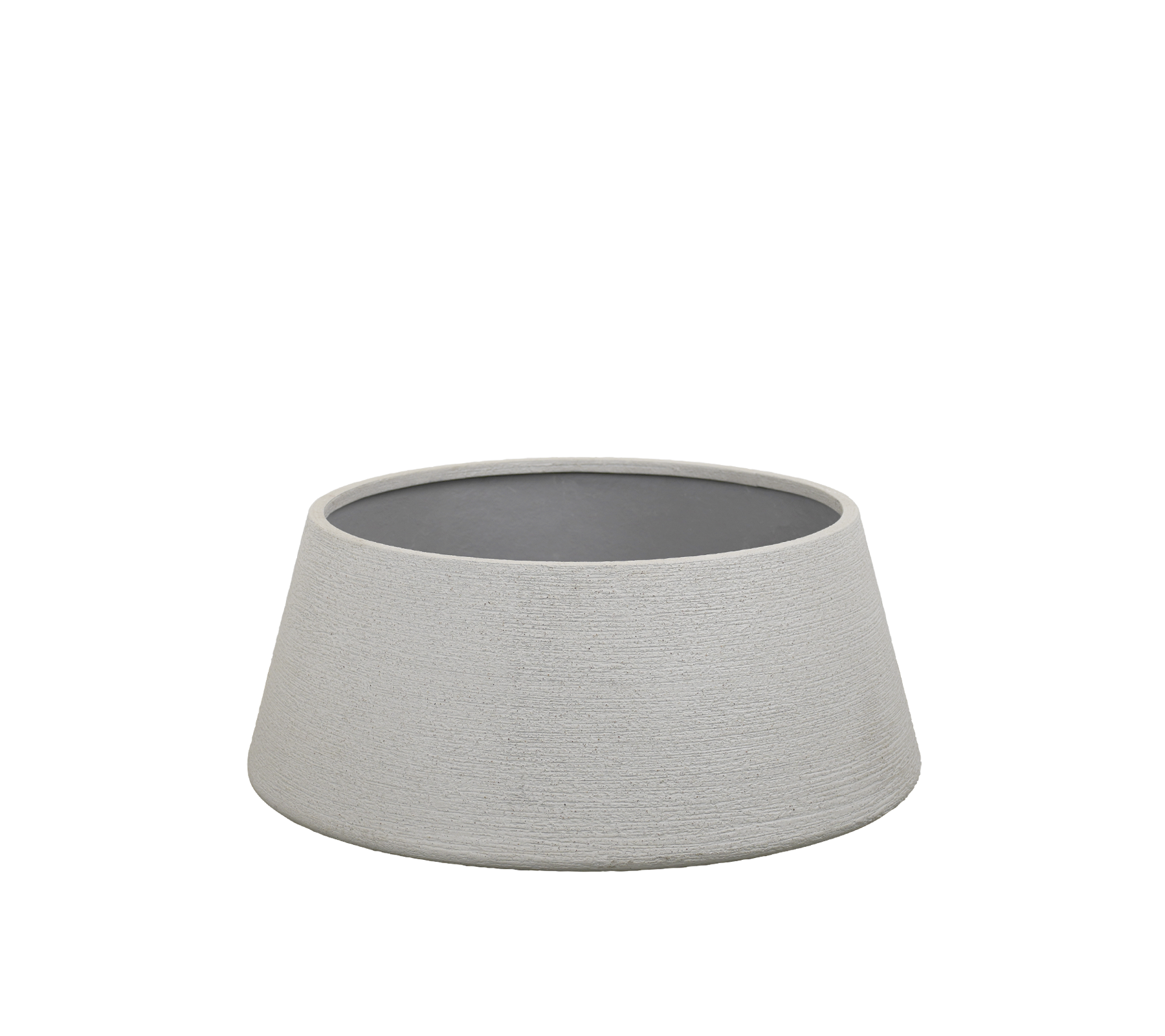 Grå bolle med teksturert utside og mørk innside.