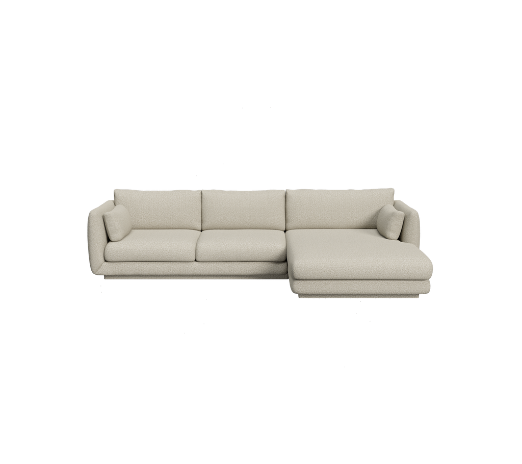 Lysbrun seksjonssofa med minimalistisk design.