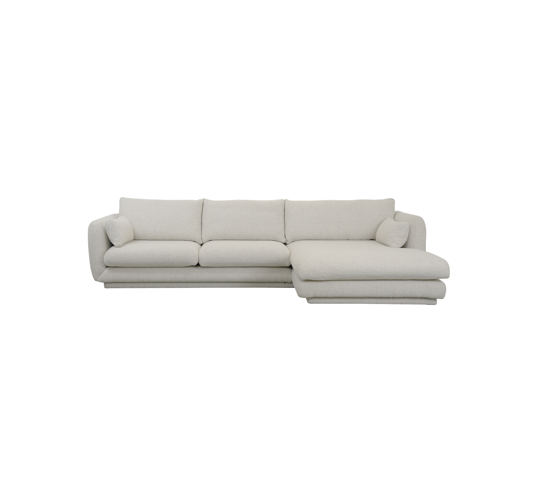 Moderne sandfarget sofa med rene linjer og myke puter.