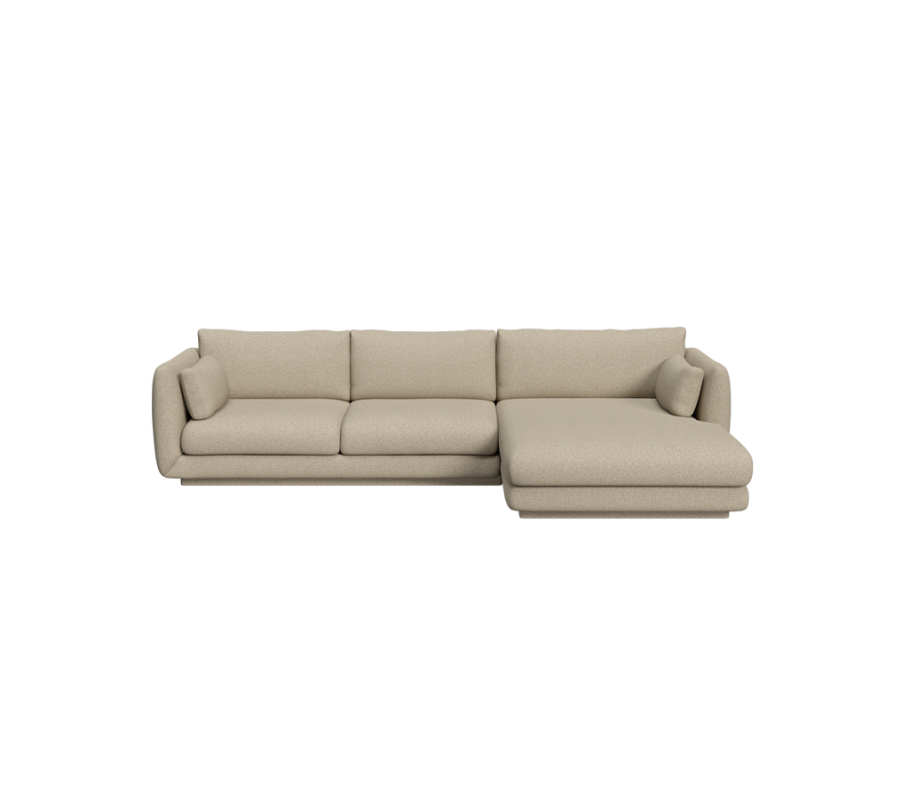 Brun moderne sofa med en chaiselong i en loungeinnstilling.