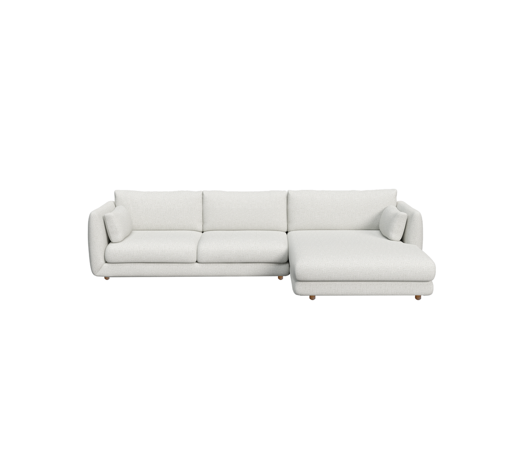Lys grå moderne seksjonelt sofa med et rent design.
