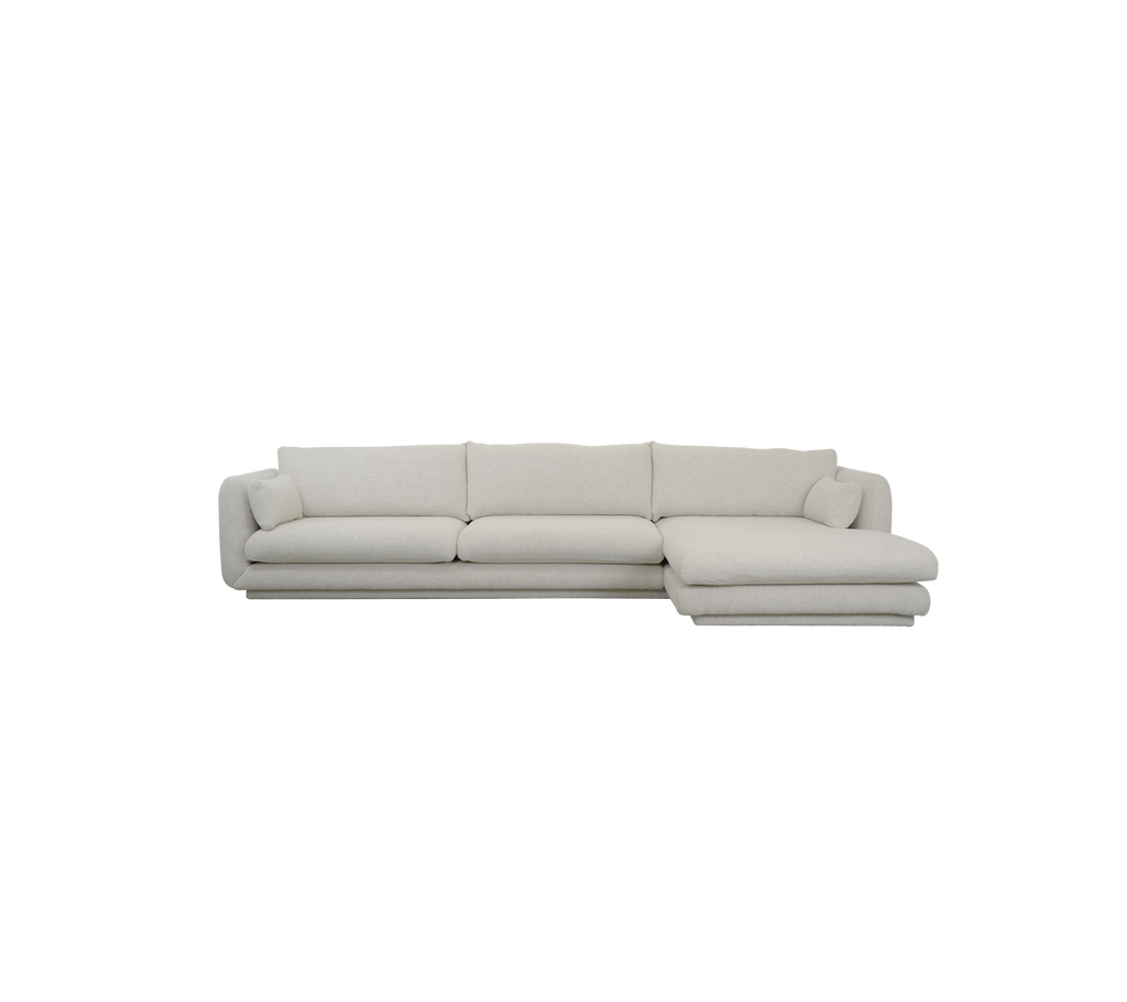 Moderne sandfarget sofa med et rent design.