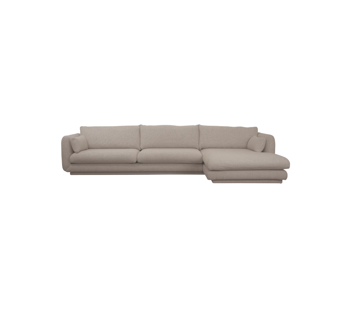 Lys brun seksjonert sofa i en moderne lounge-setting.