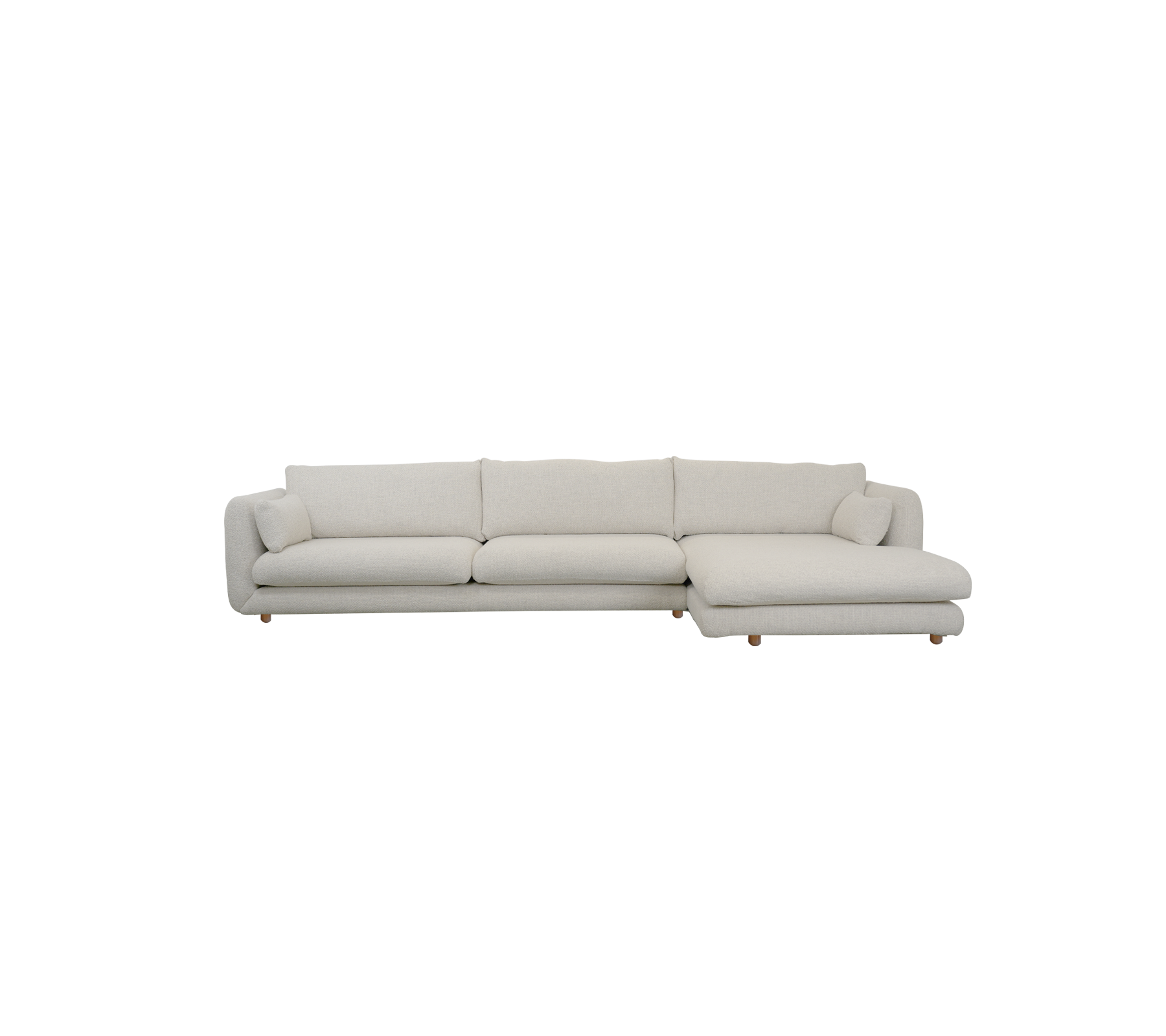 Moderne sandfarget sofa med seksjonelt design.