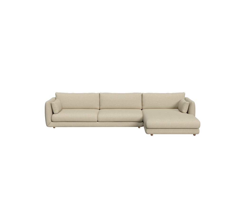 Lysbrun moderne seksjonert sofa i en moderne stueinnredning.