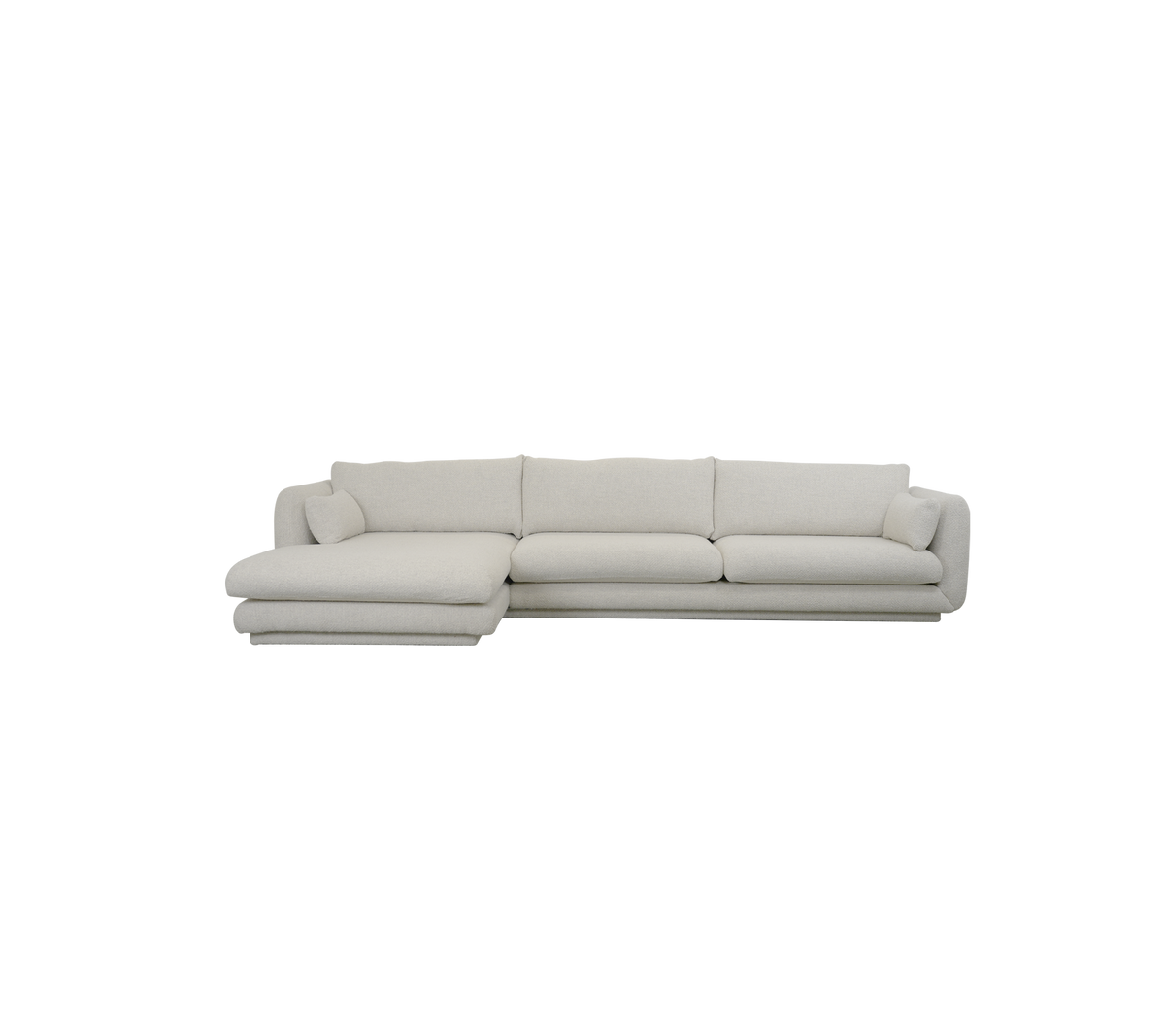 Moderne sandfarget sofa med seksjonelt design og myke puter.