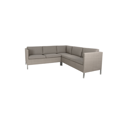 Koselig hjørnesofa med myke grå puter og slank design, perfekt for spise- eller loungeområder.